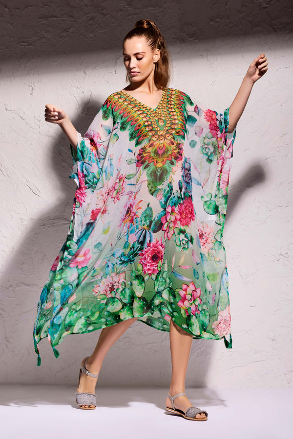 PONCHO CON SPACCHI LATERALI FLOWERS